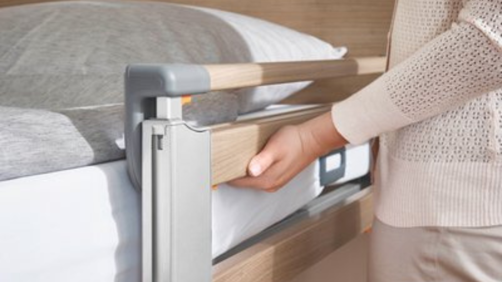 close up of home care bed handset controls and positioning features